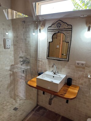Shower, eco-friendly toiletries, hair dryer, bidet