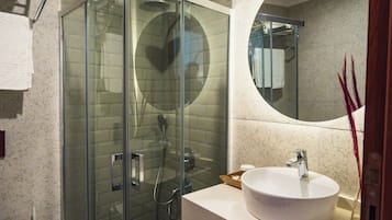 Shower, hair dryer, slippers, towels