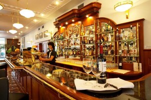 Lunch, dinner served; local and international cuisine, garden views