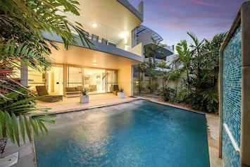 The beautiful pool area is ideal for refreshing daytime dips and relaxing sunset swims.