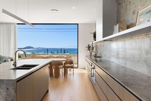 Fridge, microwave, oven, stovetop - The Skyview - Panoramic Beach House with Lap Pool (Mooloolaba Region)