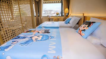 Family Studio Suite, Courtyard View | Premium bedding, down comforters, laptop workspace, blackout drapes