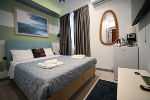 1 habitación, tabla de planchar con plancha, wifi gratis y ropa de cama 