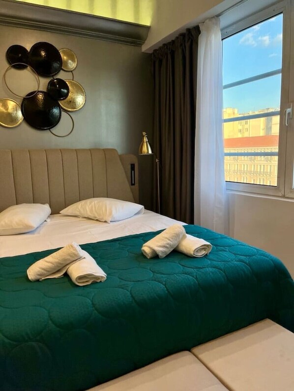 1 chambre, fer et planche à repasser, Wi-Fi gratuit, draps fournis