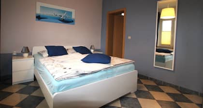 The apartment is located in the center, yet close to the beach