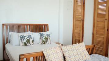 Deluxe Apartment, Kitchen, Beach View | 1 bedroom, minibar, in-room safe, laptop workspace