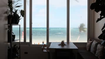 Comfort Apartment, Beach View | Living area | 42-inch Smart TV with digital channels, Netflix, streaming services