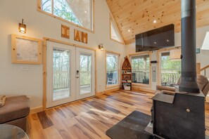 TV - Peaceful A-frame cabin with hot tub, forest views, modern comfort, and total privacy in nature. (Radford)