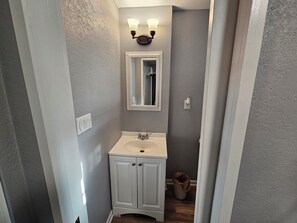 Shower, towels, soap, toilet paper