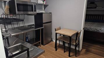 Fridge, microwave, coffee/tea maker, toaster