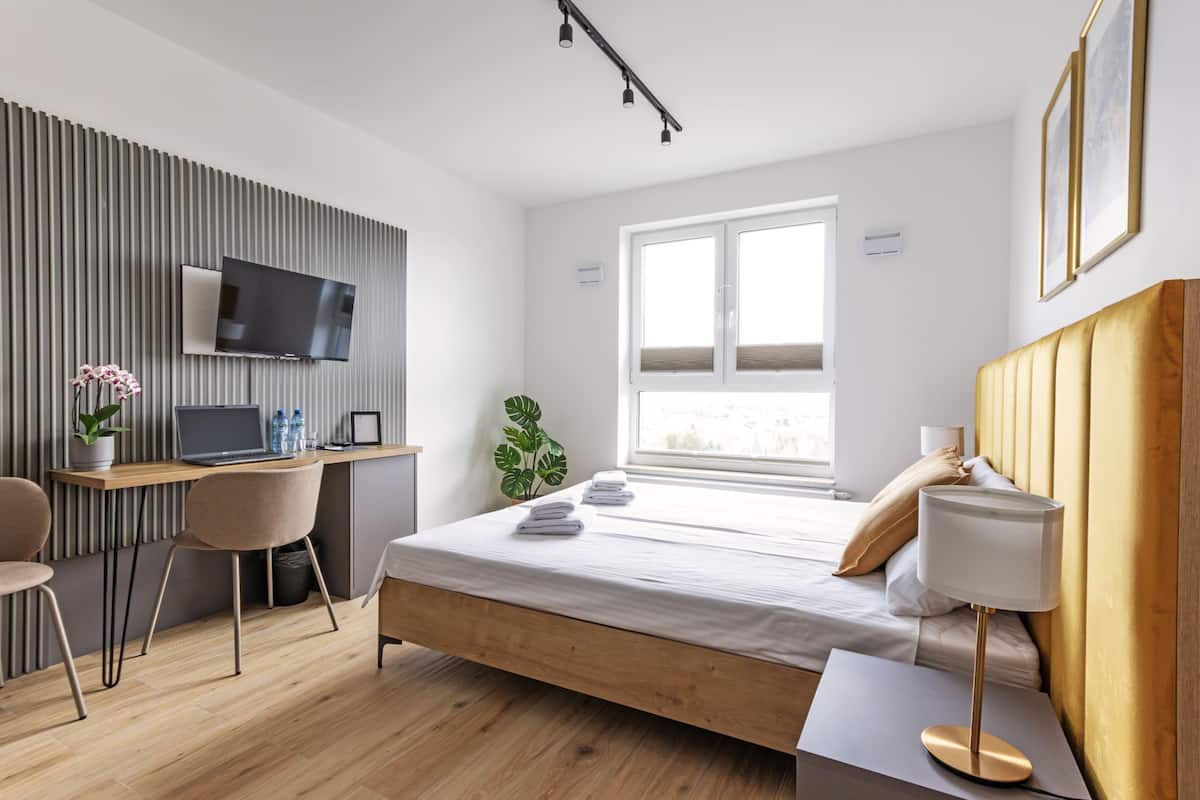 Desk, laptop workspace, free WiFi, bed sheets