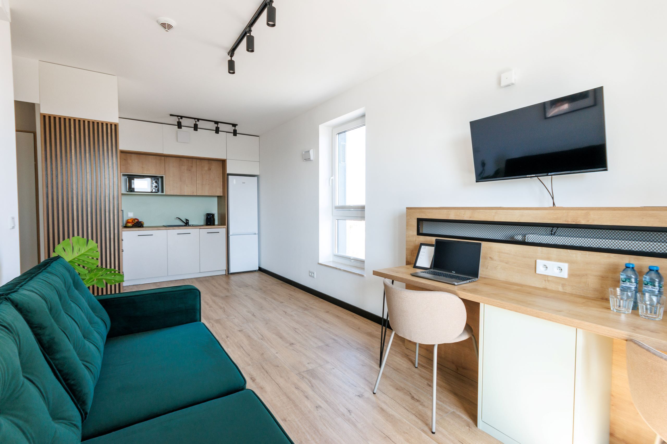 Premium Apartment, Kitchenette | Desk, laptop workspace, free WiFi, bed sheets