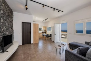 NG Thalassa with Private Hot Tub | Living area | Flat-screen TV