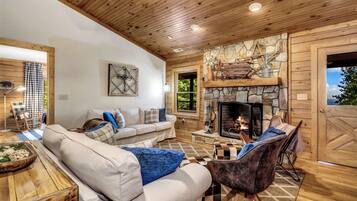 Signature Cabin, 4 Bedrooms, Non Smoking, Kitchen | Living room | 50-inch Smart TV with digital channels