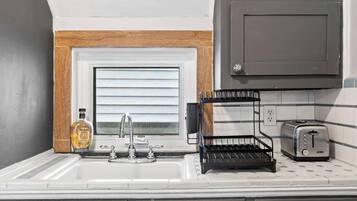 Fridge, microwave, coffee/tea maker, toaster