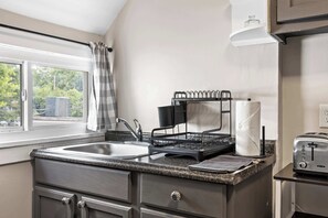 Fridge, microwave, coffee/tea maker, toaster