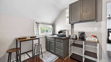 Fridge, microwave, coffee/tea maker, toaster