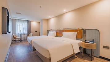 Desk, laptop workspace, free WiFi, bed sheets