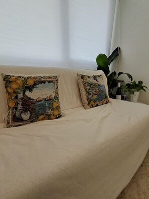 Comfort Apartment | Living area | 36-inch flat-screen TV with digital channels