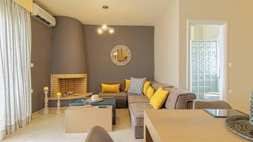 Comfort Villa, 3 Bedrooms, Sea View | Living area | 50-inch Smart TV with satellite channels