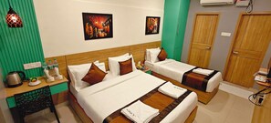 ห้องดีลั กซ์ทริปเปิล | ผ้าปูที่นอนฝ้ายอียิปต์, เครื่องนอนระดับพรีเมียม, ผ้านวมขนเป็ด