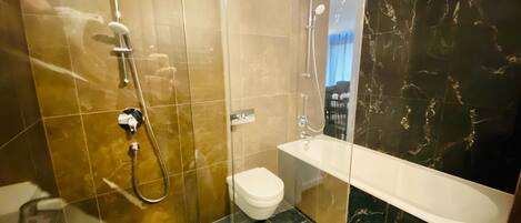 Hair dryer, towels, soap, toilet paper