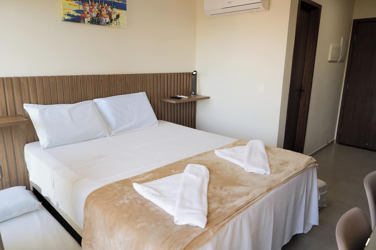 Estúdio standard, 1 quarto | 1 quarto, individualmente mobiliados, Wi-Fi de cortesia, roupa de cama