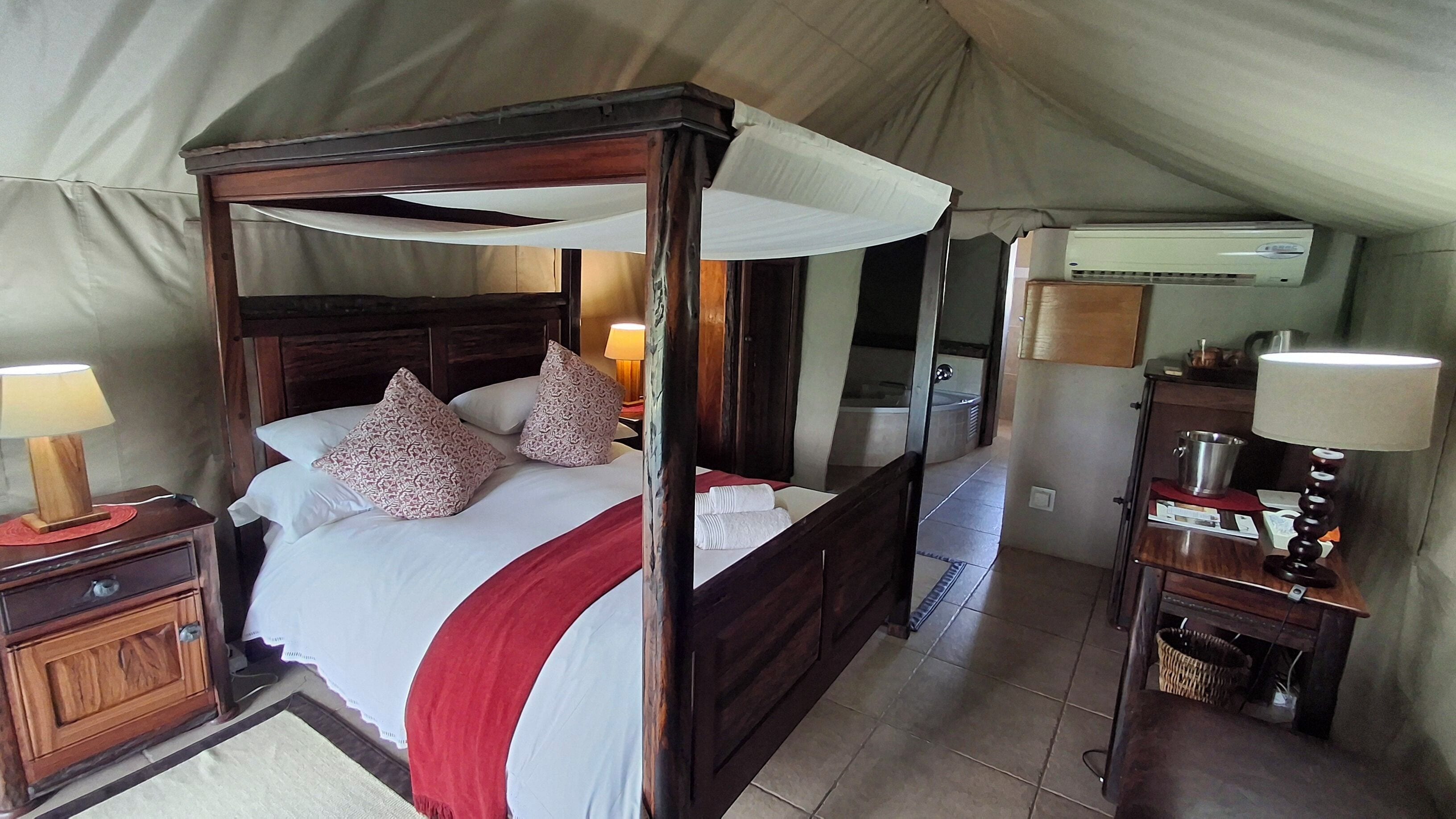 Tente Luxe | Coffres-forts dans les chambres, bureau, Wi-Fi gratuit, draps fournis