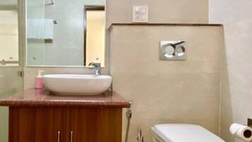Shower, free toiletries, towels, soap