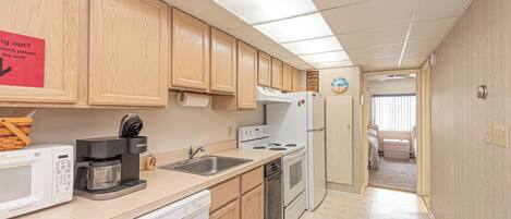Coffee/tea maker, fridge, microwave, oven