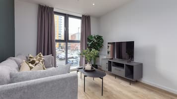 Classic Apartment | Living area | 32-inch Smart TV with digital channels