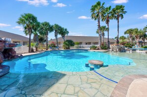 A heated pool - Pet-Friendly Condo | Poolside Living & Garage Access (Corpus Christi)