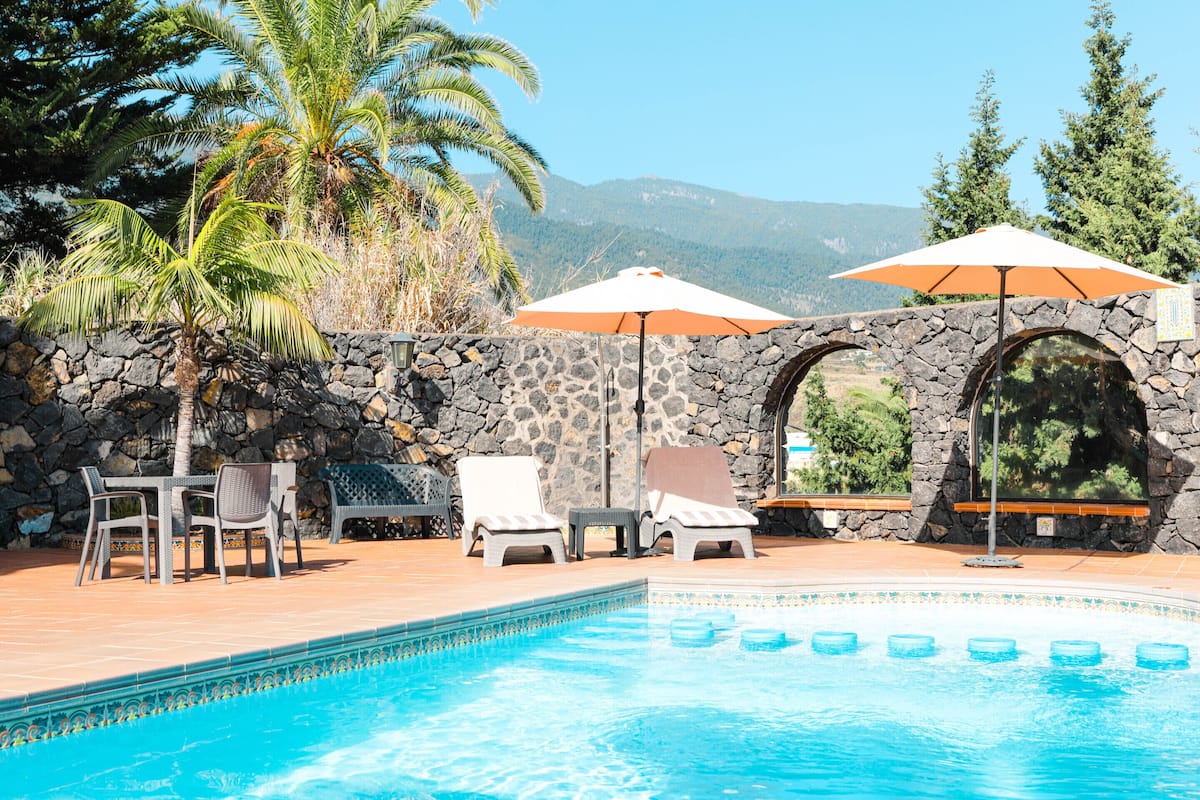 Outdoor pool, pool umbrellas, pool loungers