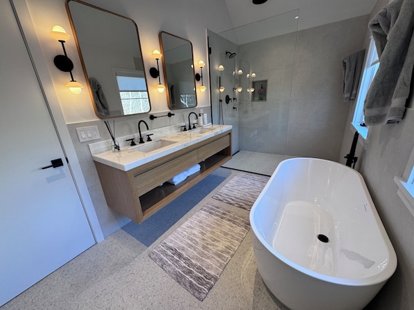 Shower, towels, soap, toilet paper