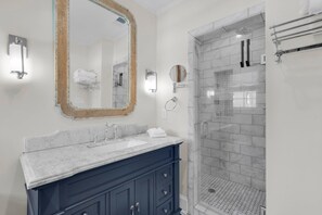 Shower, hair dryer, towels