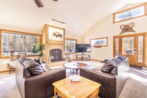 Smart TV, fireplace, foosball, books