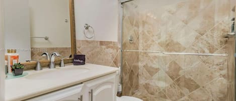 Hair dryer, towels, soap, toilet paper