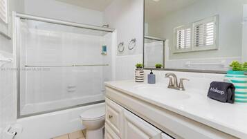 Hair dryer, towels, soap, toilet paper