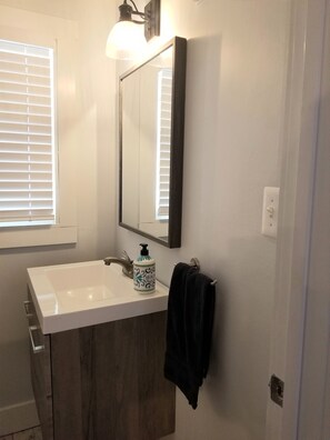 Hair dryer, towels, soap, toilet paper