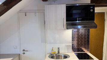 Microondas, parrilla de estufa y lavavajillas