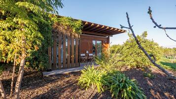 Deluxe-Apartment, zum Garten hin | Terrasse/Patio