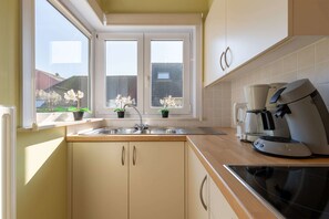 Apartment | Private kitchen | High chair - Flat by Seafront and Shopping Center (Blankenberge)