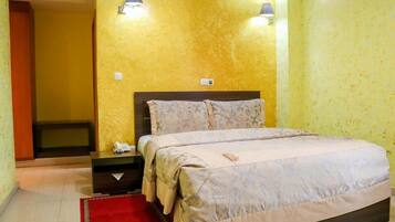 Standard Room, City View | 1 bedroom, desk, laptop workspace, iron/ironing board