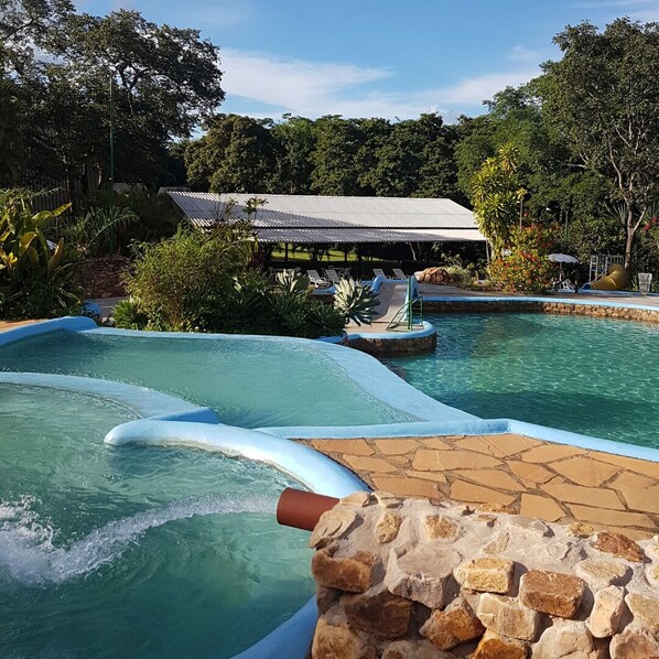 3 outdoor pools, pool umbrellas, pool loungers