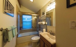 Jetted bath, hair dryer, towels, soap