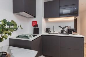 Fridge, microwave, toaster, cookware/dishes/utensils