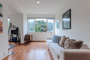 Apartment, Mountain View | Living area | Flat-screen TV