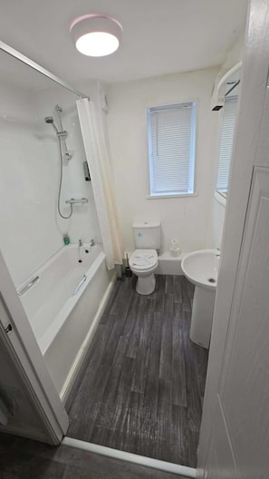 Hair dryer, towels, soap, shampoo