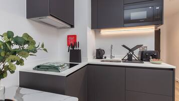 Fridge, microwave, toaster, cookware/dishes/utensils