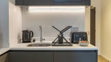 Fridge, microwave, toaster, cookware/dishes/utensils